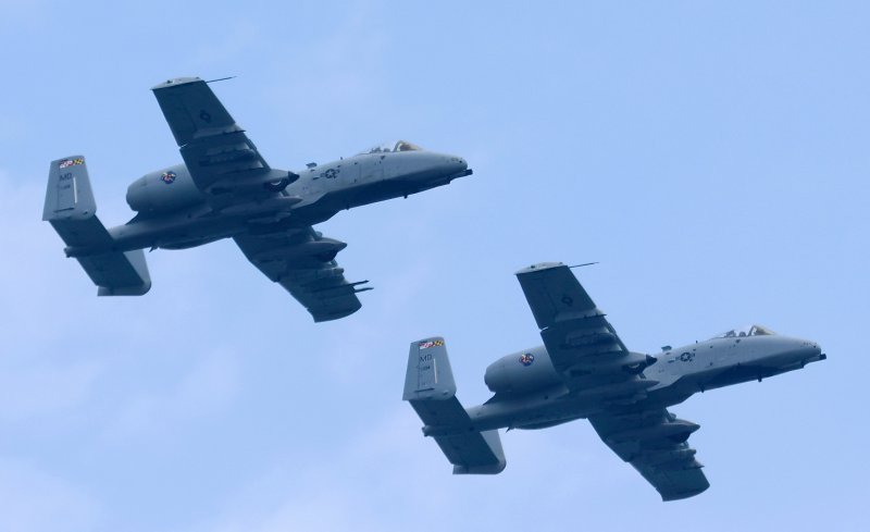 A pair of Maryland Air National Guard A-10 Warthogs pass by the beach June 13. The planes, which are based in Baltimore, might have made their final Ocean City Air Show appearance because they are expected to be retired later this year.